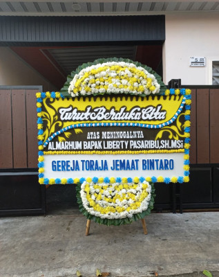 Papan Bunga Duka di Cikembang